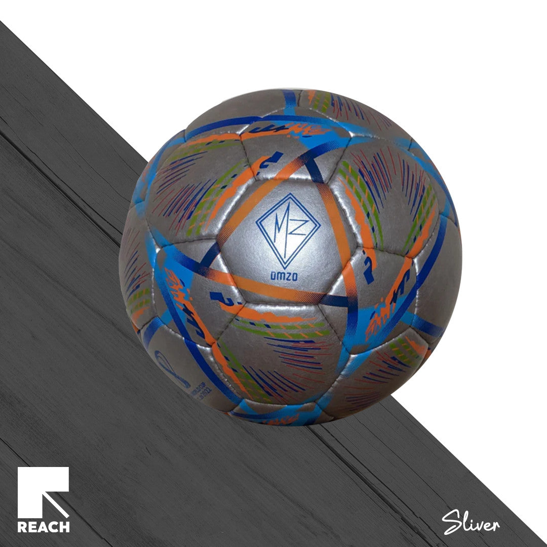 A multicolored handcrafted football with geometric patterns and the letters 'MY' on it, set against a white background with a black and white diagonal gradient.